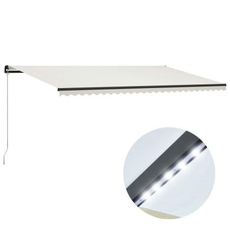 vidaXL Toldo retráctil manual con luz LED color crema 600x300 cm