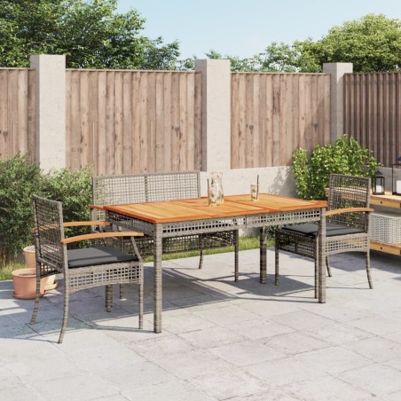 vidaXL Juego de comedor de jardín 4 piezas con cojines ratán PE gris
