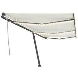 vidaXL Toldo retráctil manual con luz LED color crema 600x300 cm