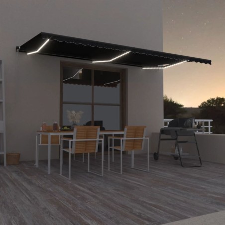 vidaXL Toldo retráctil manual con luz LED gris antracita 600x350 cm