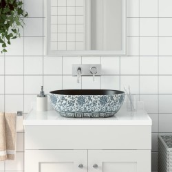 vidaXL Lavabo sobre encimera ovalado cerámica negro y azul 47x33x13 cm