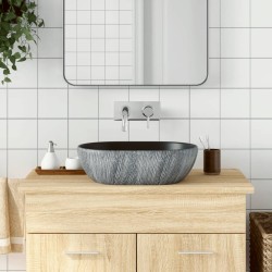 vidaXL Lavabo sobre encimera ovalado cerámica negro y gris 47x33x13 cm