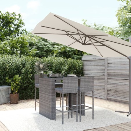 vidaXL Mesa y taburetes altos jardín 5 piezas y cojines ratán PE gris