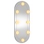 vidaXL Espejo de pared ovalado con luces LED vidrio 20x50 cm vidaXL Espejo de pared ovalado con luces LED vidrio 20x50 cm