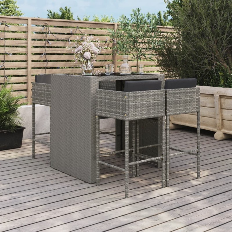 vidaXL Mesa y taburetes altos jardín 5 piezas y cojines ratán PE gris