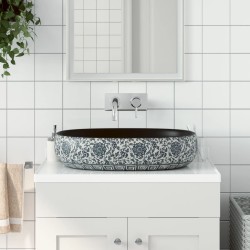 vidaXL Lavabo sobre encimera ovalado cerámica negro y azul 59x40x14 cm