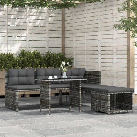 vidaXL Juego de comedor de jardín 4 piezas con cojines ratán PE gris