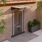 vidaXL Marquesina puerta policarbonato negro y transparente 152,5x90cm