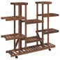 vidaXL Soporte de flores con ruedas madera maciza abeto 110x25x115 cm vidaXL Soporte de flores con ruedas madera maciza abeto 110x25x115 cm