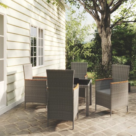 vidaXL Set de comedor de jardín 5 pzas y cojines ratán sintético gris
