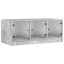 vidaXL Mesa de centro con puertas de vidrio grs hormigón 102x50x42 cm
