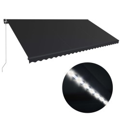 vidaXL Toldo retráctil manual con luz LED gris antracita 600x300 cm