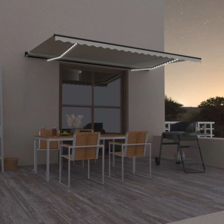 vidaXL Toldo retráctil manual con luz LED crema 500x300 cm