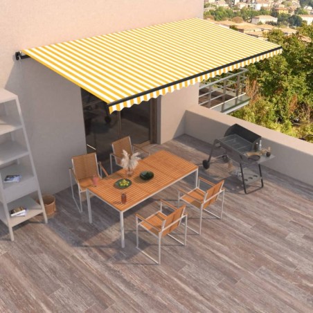 vidaXL Toldo retráctil manual amarillo y blanco 600x350 cm